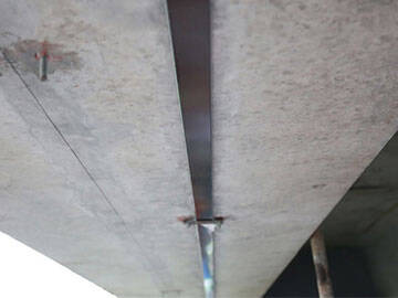 Prestressed CFRP laminate with Guilin North Expressway Interchange Bridge